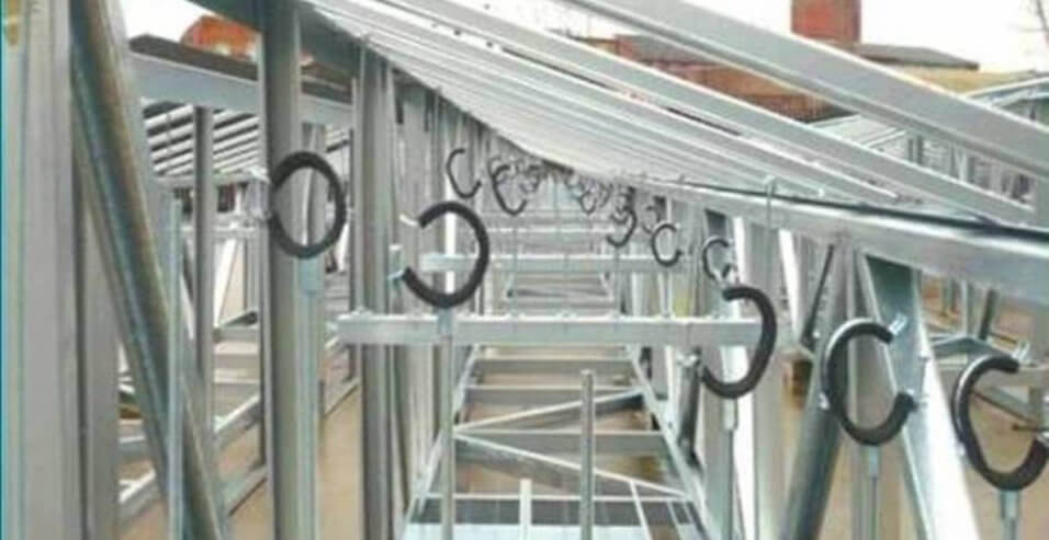 metal structure in place on building